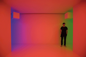 Carlos Cruz-Diez, Cromosaturación (Chromosaturation),1965-2008. Three chromo-cubicles. Site-specific environment (Fluorescent lights with blue, red and green filters). Courtesy of Americas Society Gallery, New York. Photo: Arturo Sanchez
