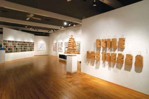 6 “Vincench vs Vincench: A Dissident Dialogue from Cuba”, Installation view: Exile, 2011, Kraft Paper and Twine, 17” x 60” / Destierro, 2011, Kraft Paper and Twine, 19 ½” x 100” x 5 ½” / Reconciliation Tree, 2011, Incised Cedar and Steel, 50 ½” x 38 3/8” x 38 5/8” 